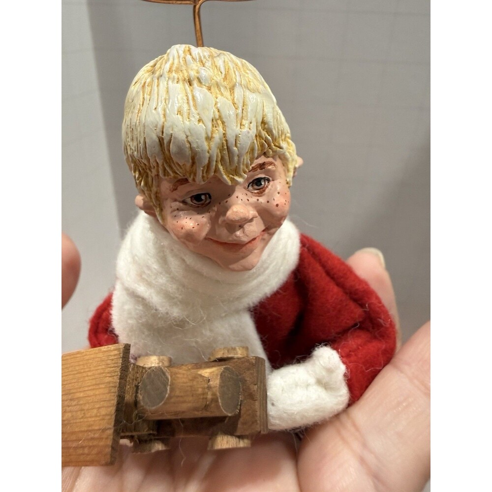 Simpich Vintage Handmade Angel Blond Hair Joe holding wooden train